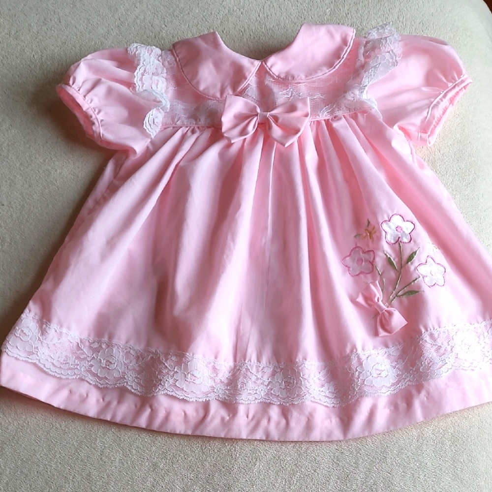 Vintage Pink Baby Dress with Floral Embroidery, Lace, Pleats, And Ruffles
